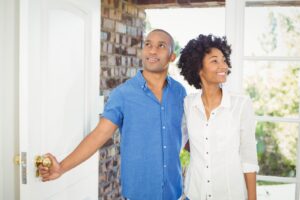 Buyers looking at a house in person